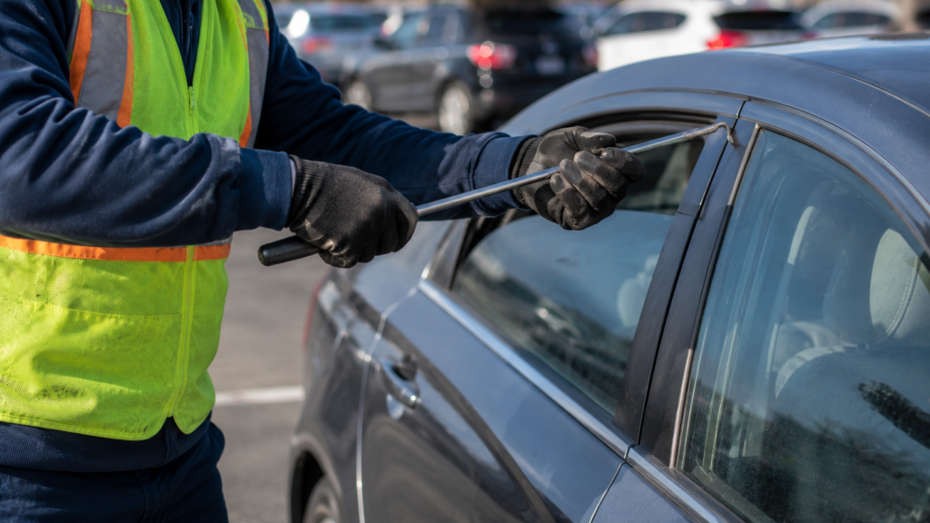 Technician performing non-destructive car lockout in East Orange NJ